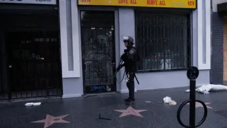 Hollywood Armed Police Officer Ordering People To Move