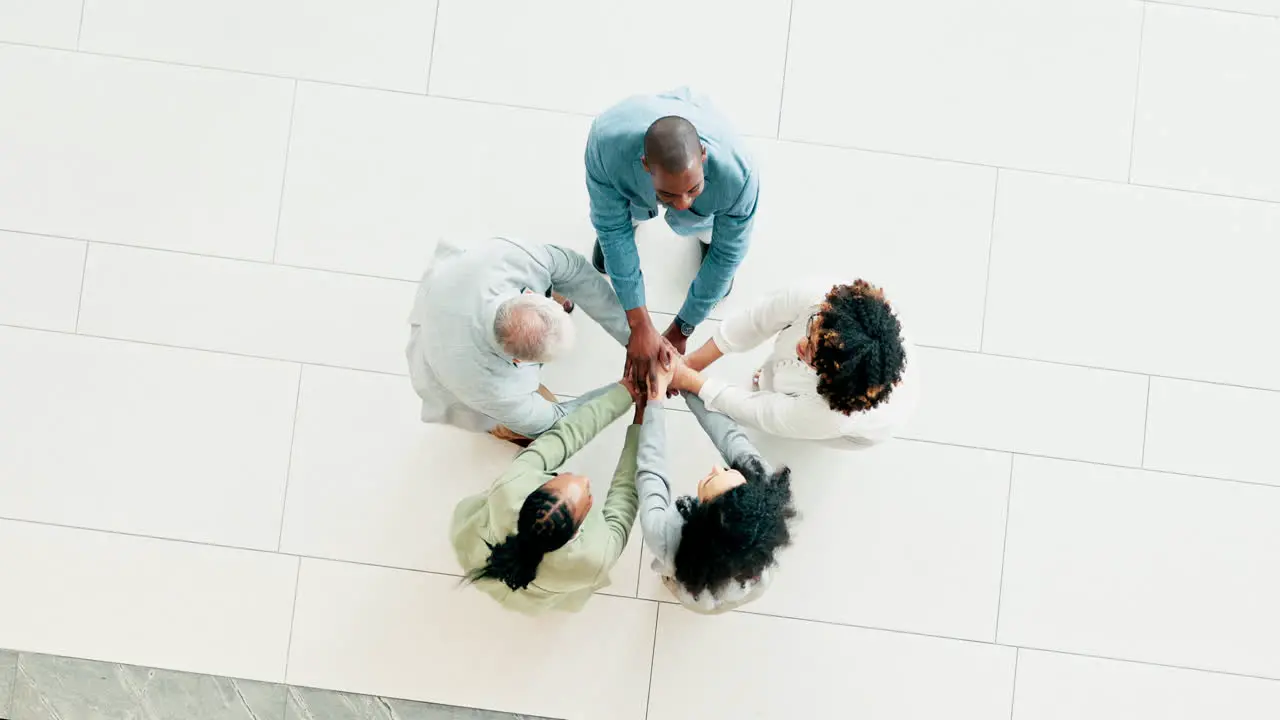 Business people hands together