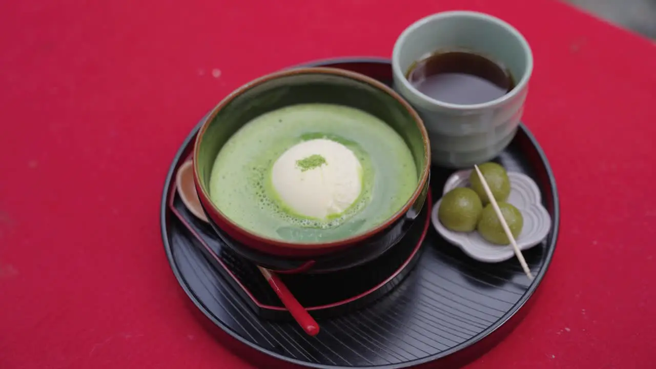 Green Tea Matcha float with Green Dango in Uji Close Pan Shot