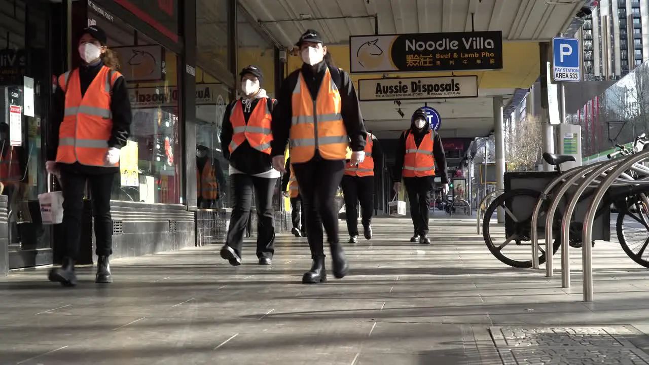 Cleaners sanitise quiet Australian streets during the coronavirus lockdown shot in Melbourne