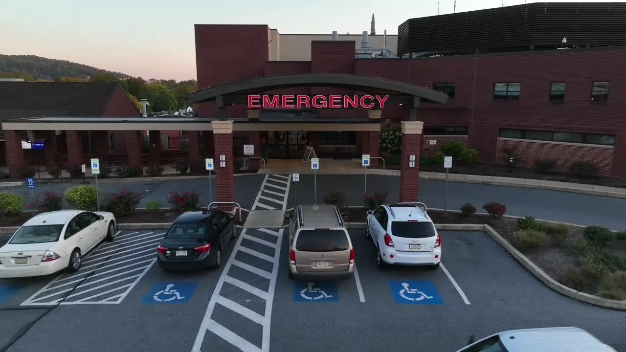 Aerial zoom out of emergency room in brand new hospital building