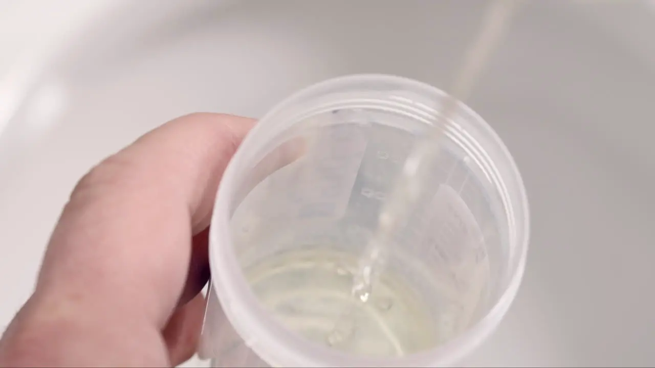 Collecting a urine sample at the doctor's office or for drug testing