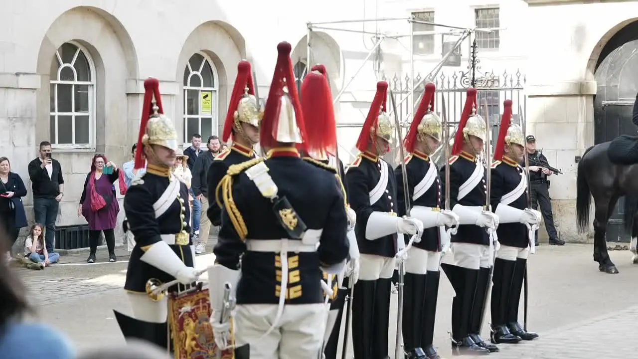 London guards having a talk mid change