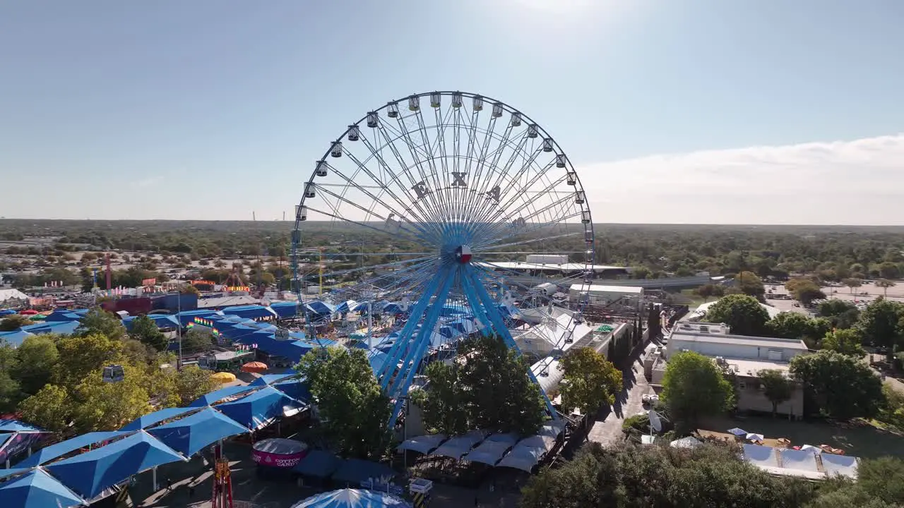 Drone rotating around Texas State Fair Ferris Wheel