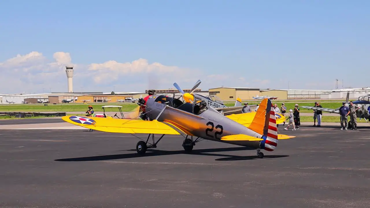 Ryan PT-22 Recruit vintage World War II training aircraft taxis at an airshow event at Centennial Airport in Colorado