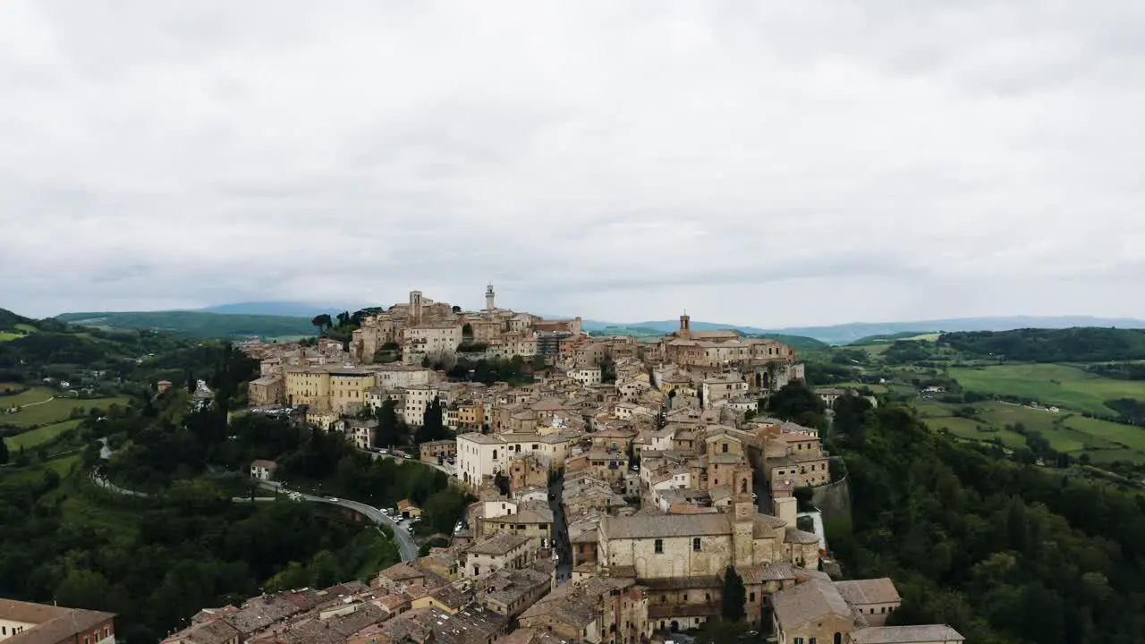 Drone shot pulling away from Montepulciano Tuscany in Italy's countryside