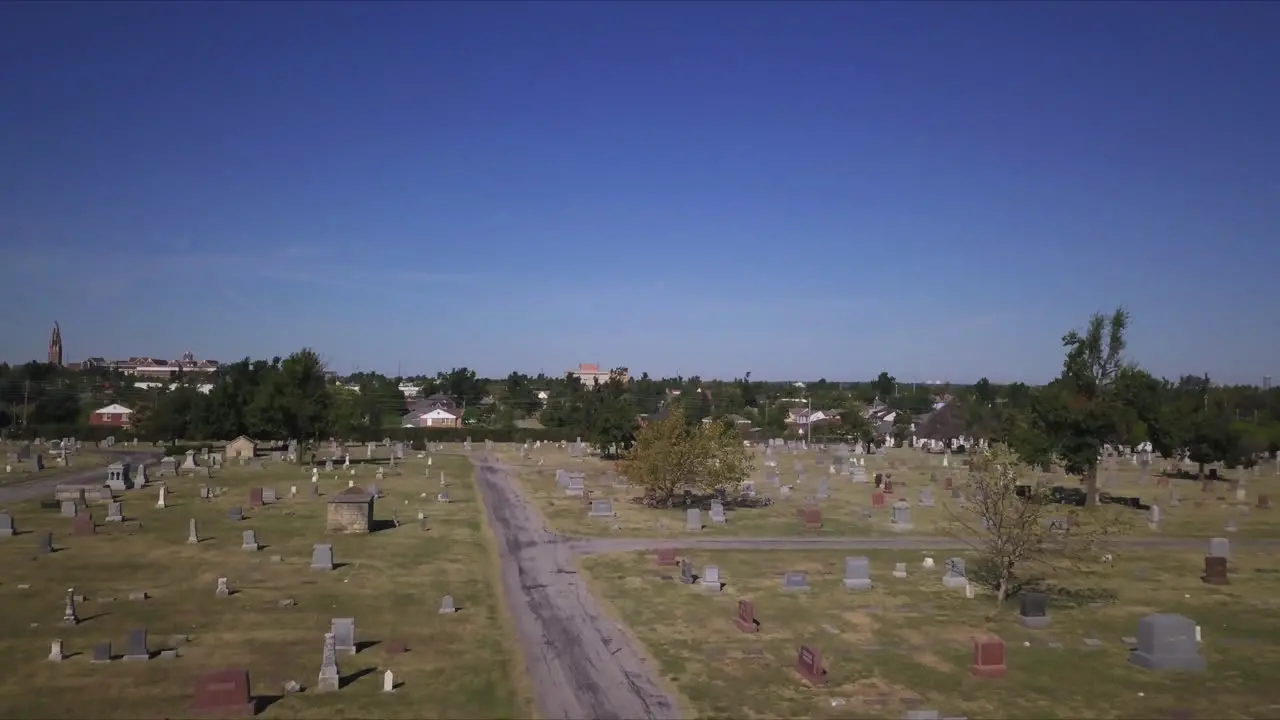 Establishing shot of a graveyard during midday