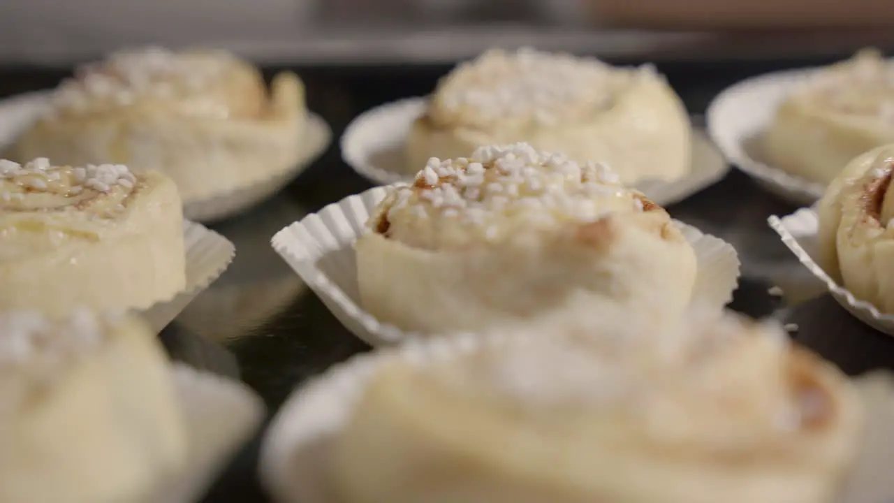 Fast slide of cinnamon buns on a tray