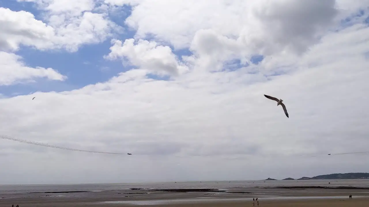 Red Arrows Fighter Plane Diving and Passing 2nd Plane During Air Show in Swansea