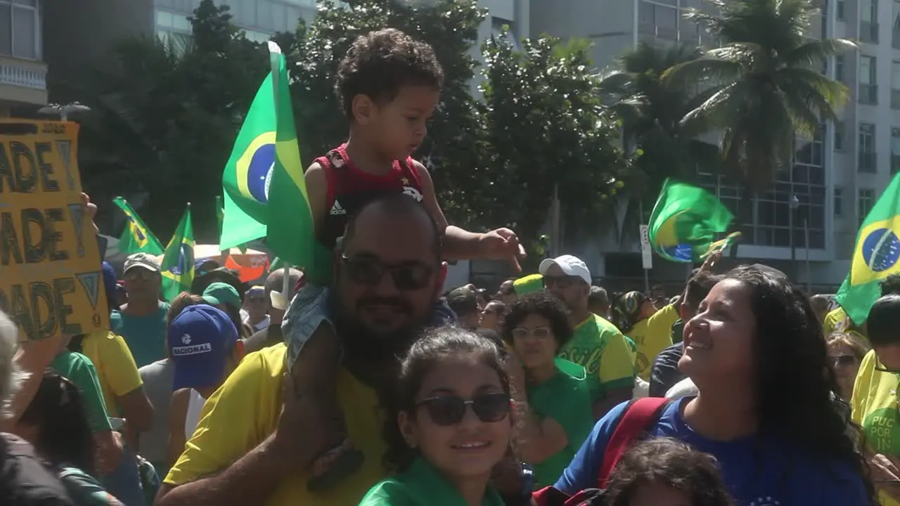 Supporters for conservative Brazilian President Bolsonaro wave flags at a reelection campaign