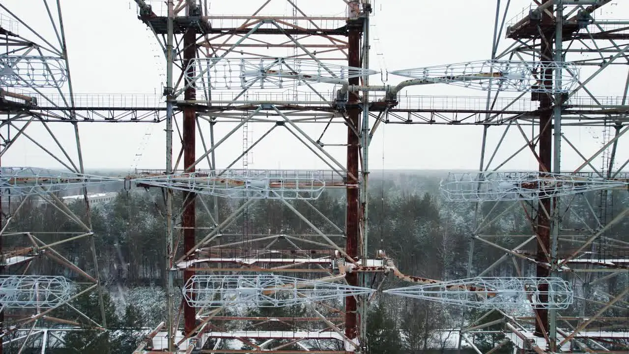 Duga radar station antenna grid above winter taiga Chernobyl Ukraine