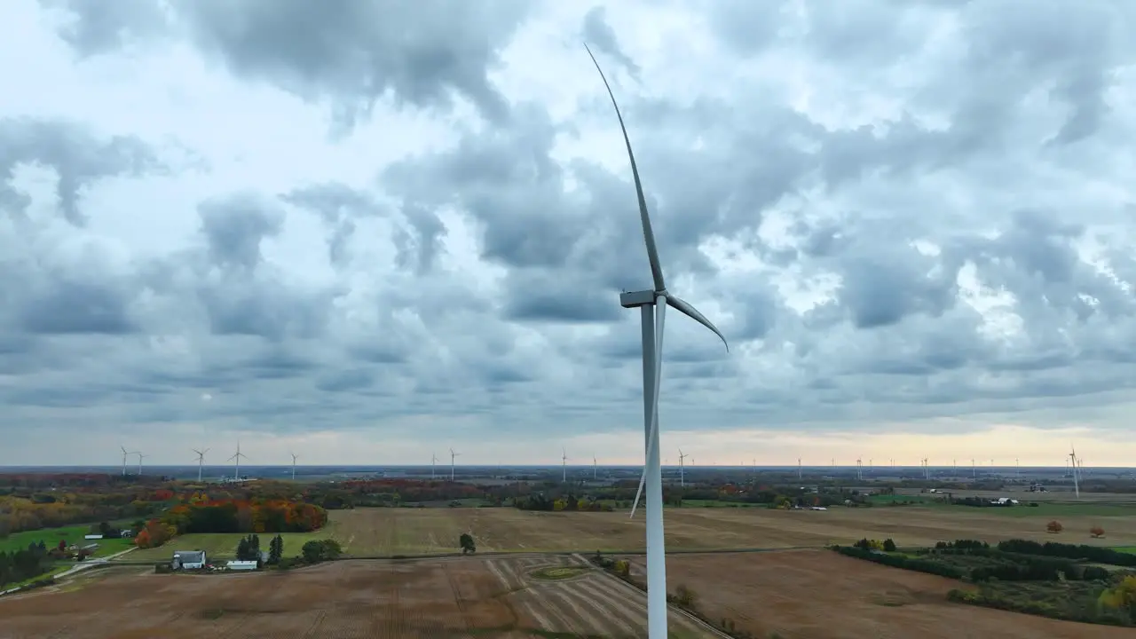 Large wind turbines in motion generating renewable energy