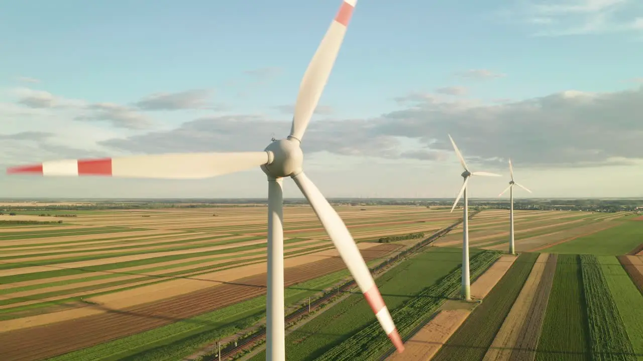 Aerial footage of a rotating wind turbine