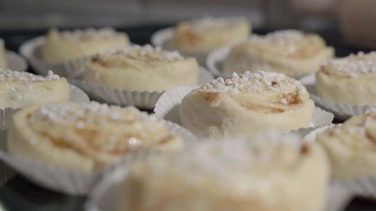 Low static close up of cinnamon buns with focus pulling