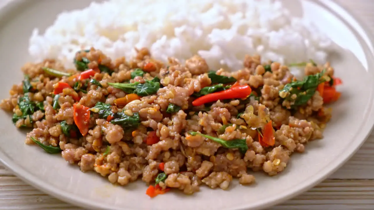 Stir fried Thai basil with minced pork and chilli on topped rice Thai local food style