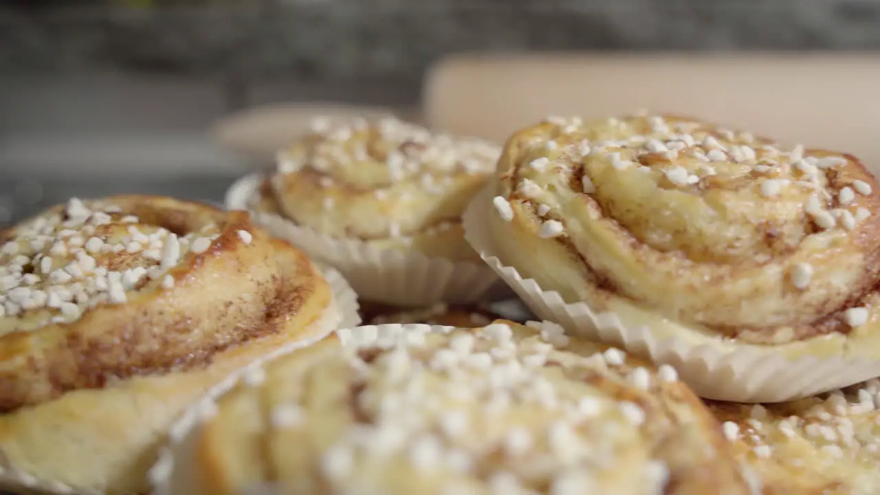 Medium shot sliding of a pile of cinnamon buns