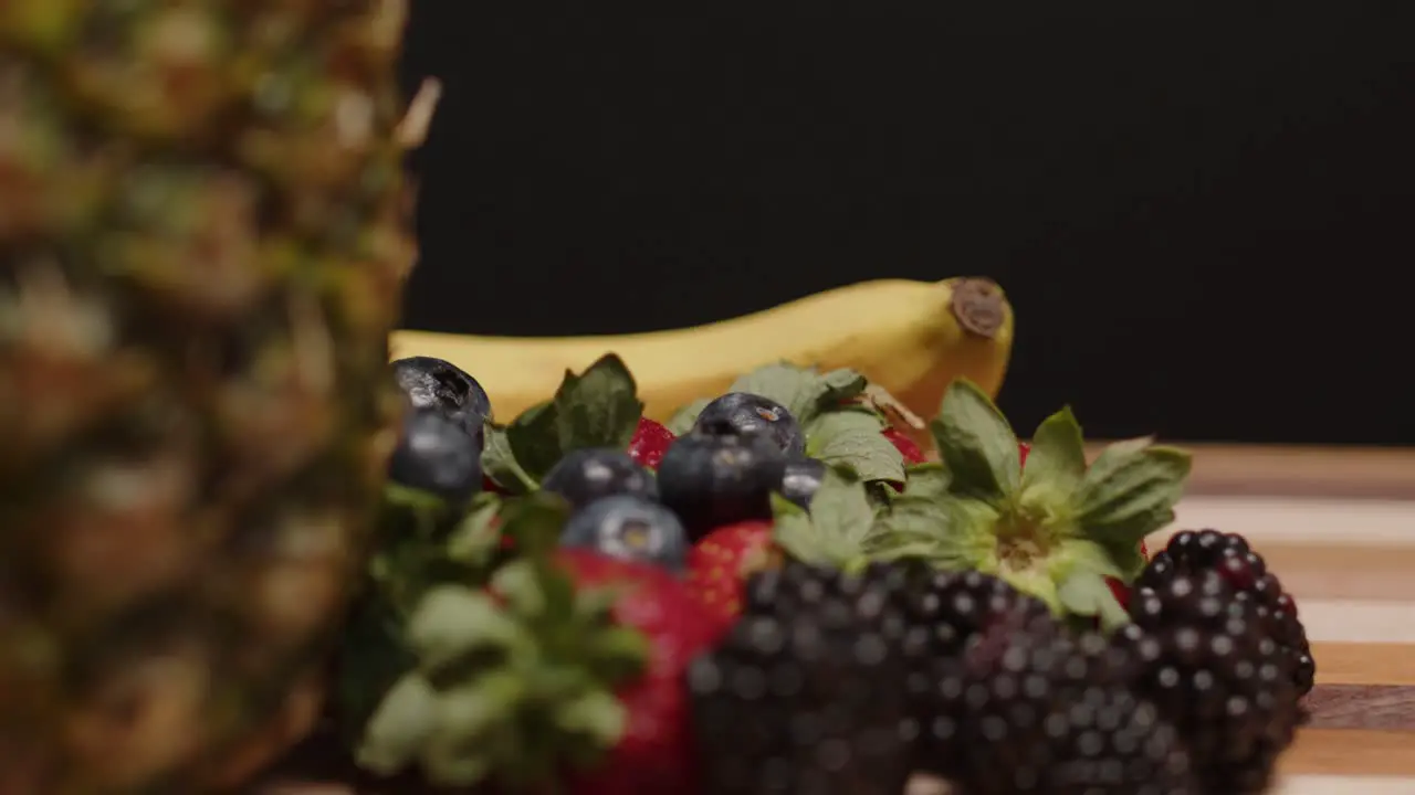 Fruits spinning on a cutting board-2