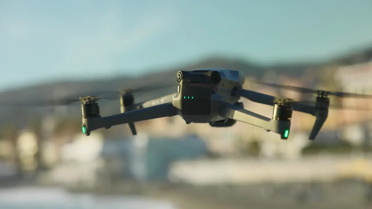 DJI Mavic 3 Pro Hovering In Mid Air With Battery Indicator Visible