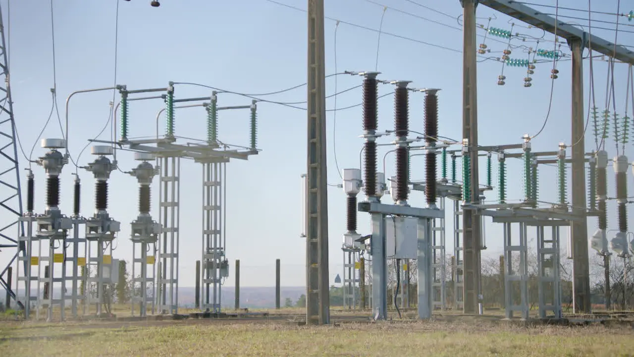 Conductors transformers transmitters at energy power substation Close-up