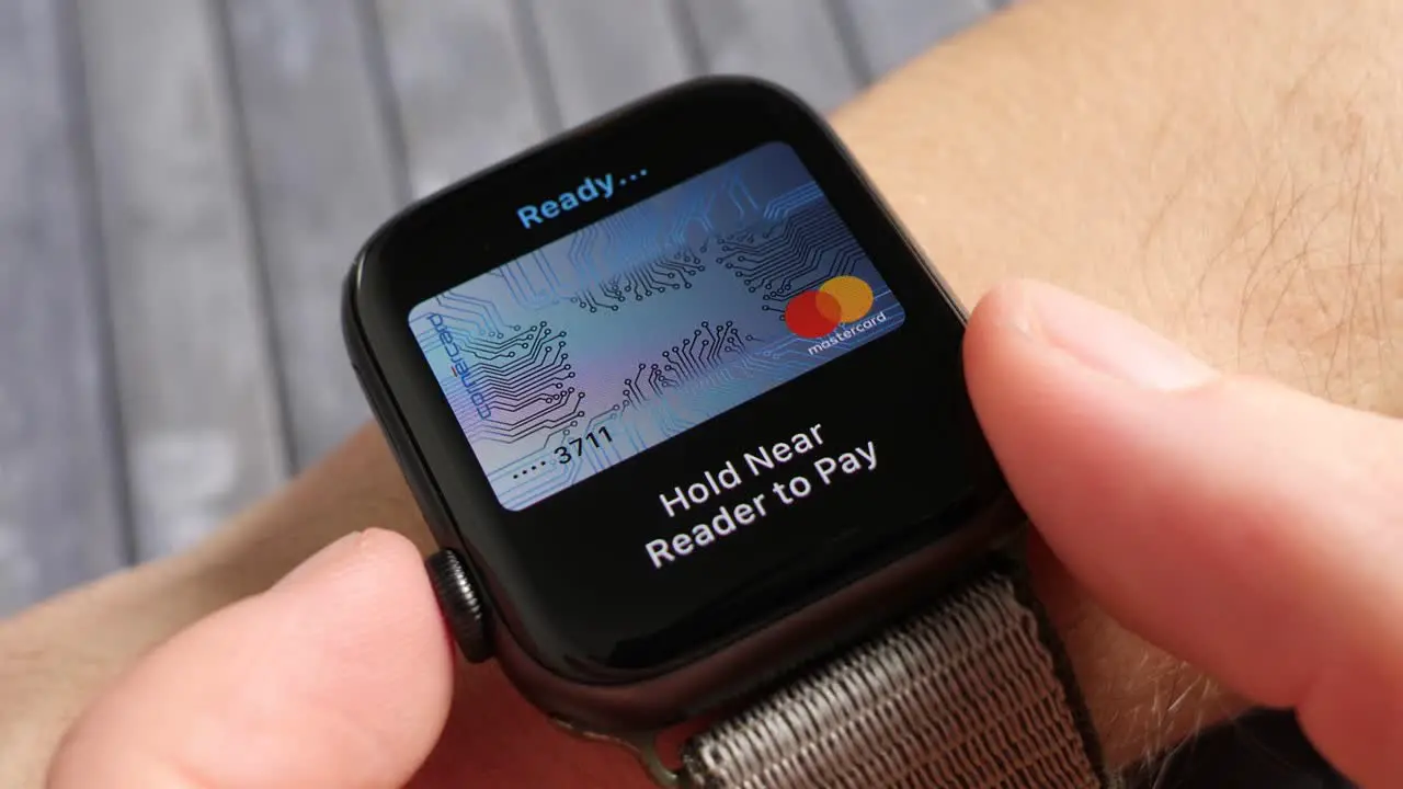 Paying with apple watch apple pay being used by a person