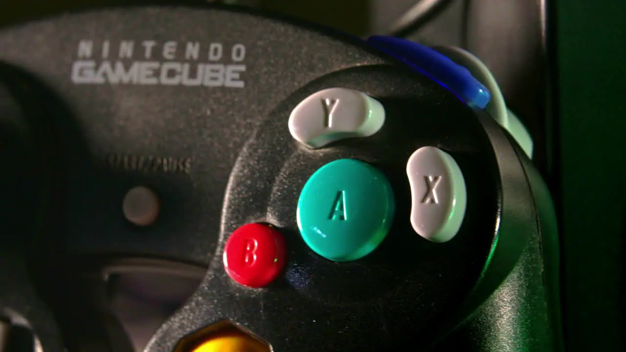 Nintendo Gamecube Controller Next to Console SLIDE LEFT