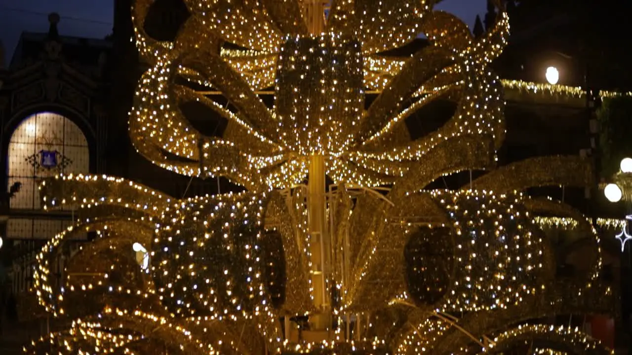 Tilt up video of a Christmas tree in the main square of Puebla city