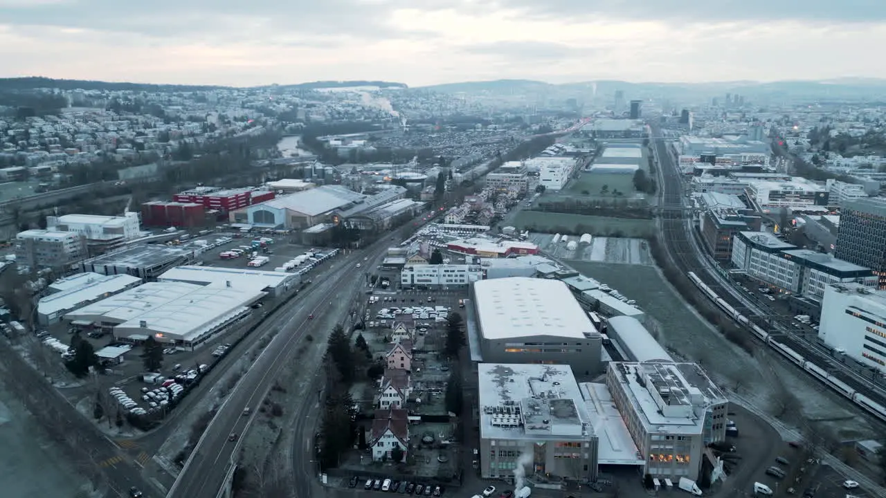 forward flight early in the morning over industrial area