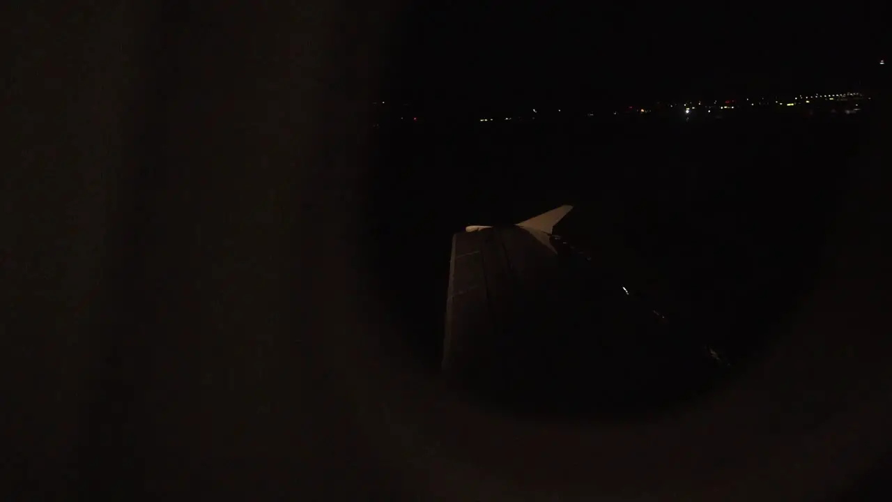 Airplane wing seen from window while landing