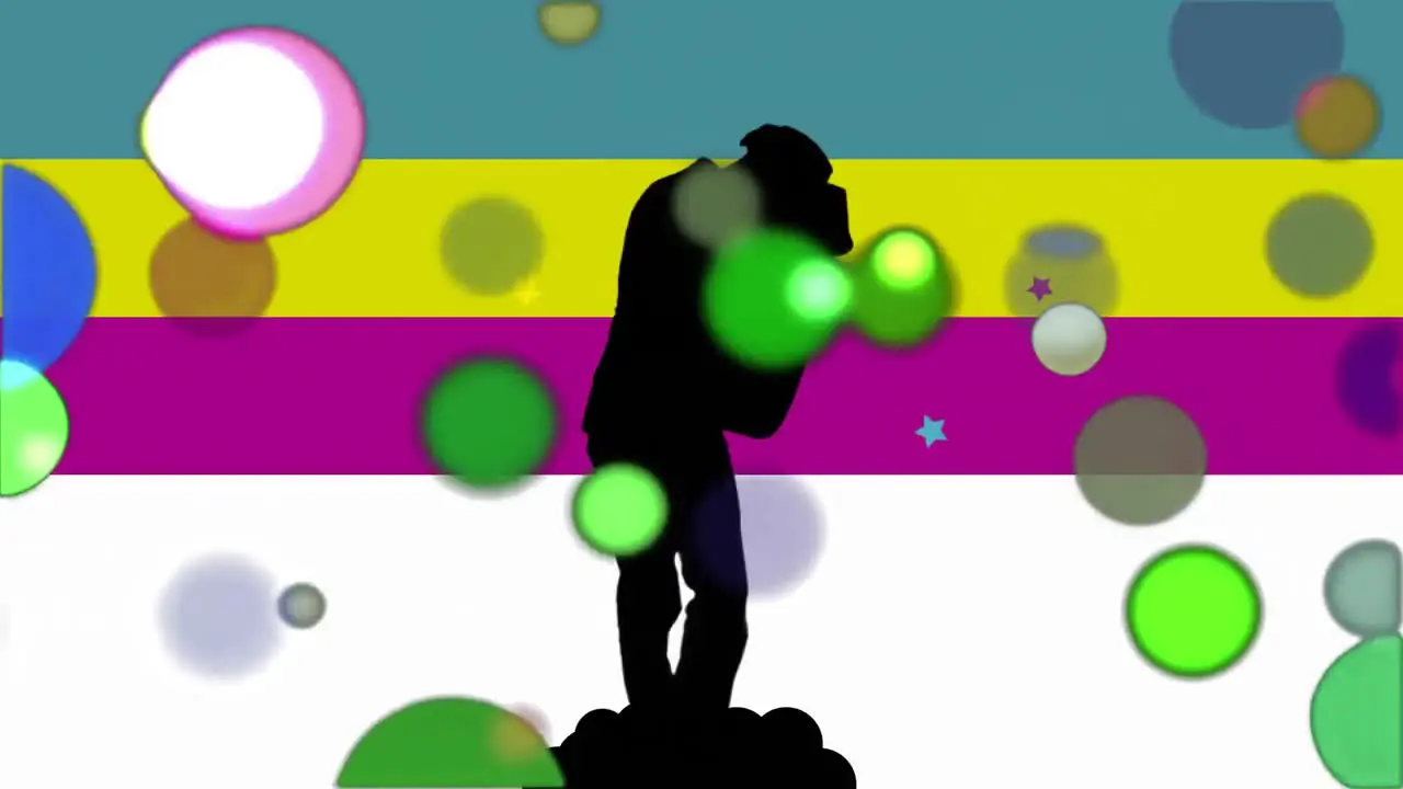 Moving spots of coloured light with dancing man and stripes