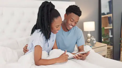 Black couple bed and tablet laughing for social