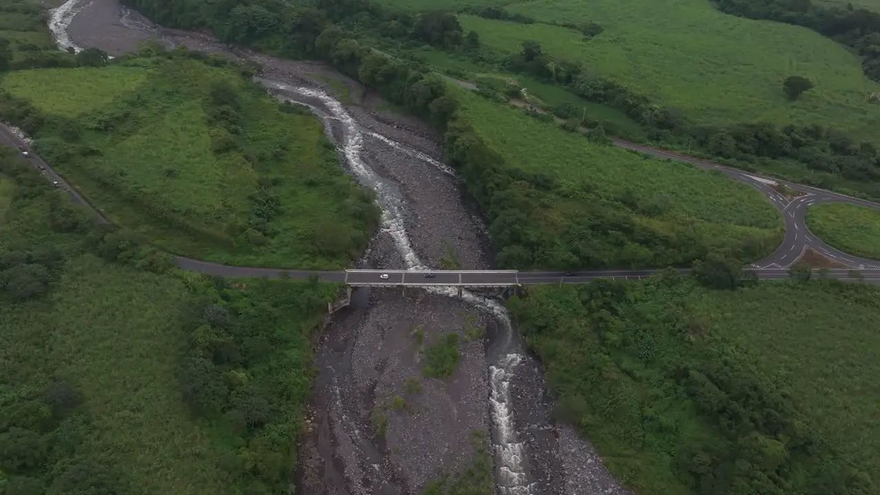 Orbit shot of bridge over the achiguate river at Guatemala during daytime aerial