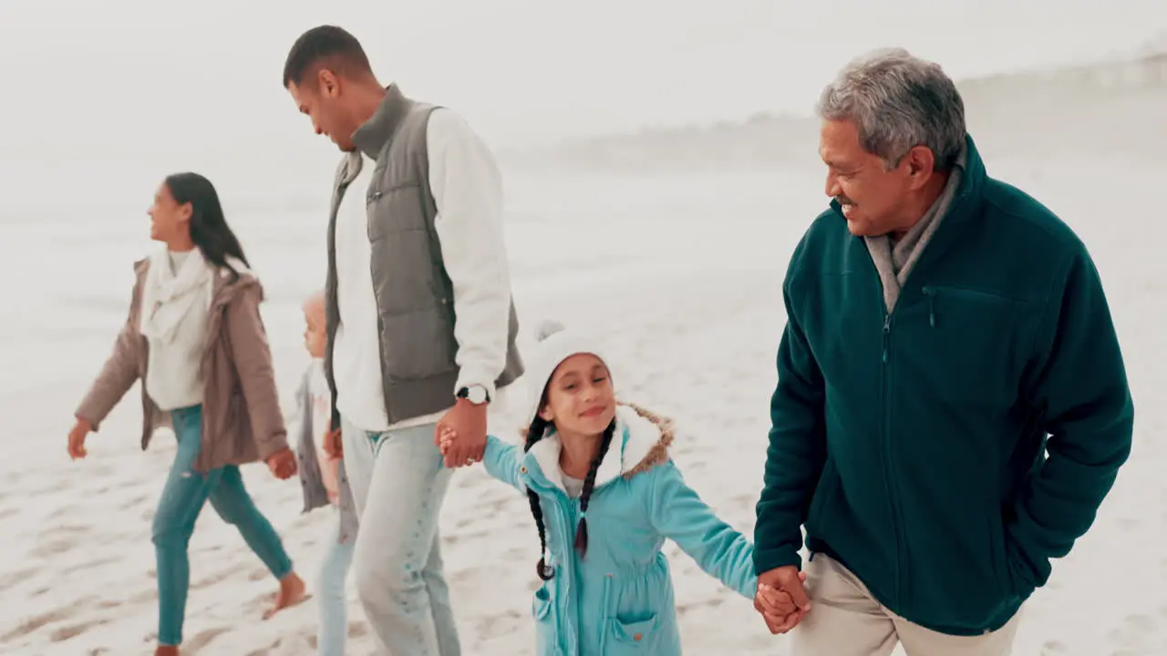 Family holiday holding hands