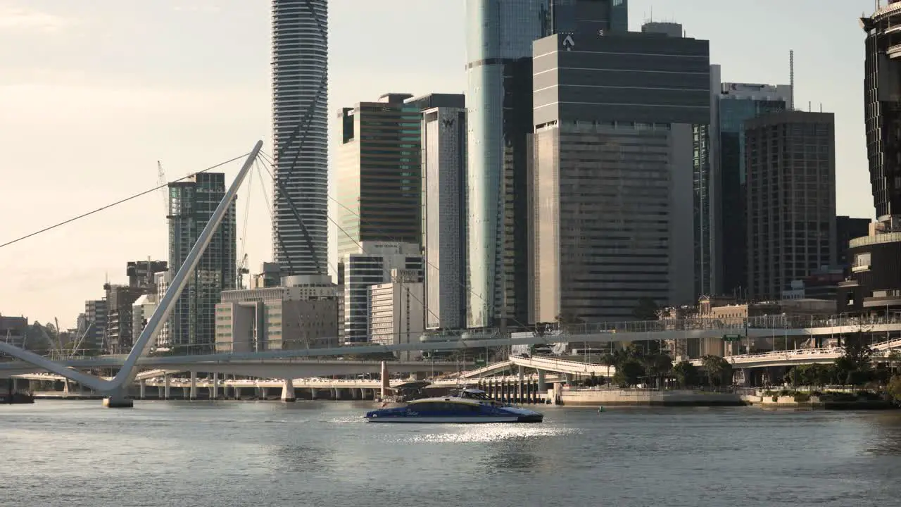 Medium view of a CityCat and Brisbane City in the afternoon light Queensland Australia