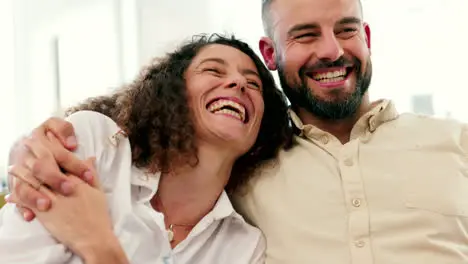 Happy love and silly couple sitting at home