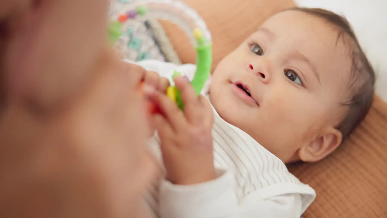 Sweet playing and cute baby with a toy