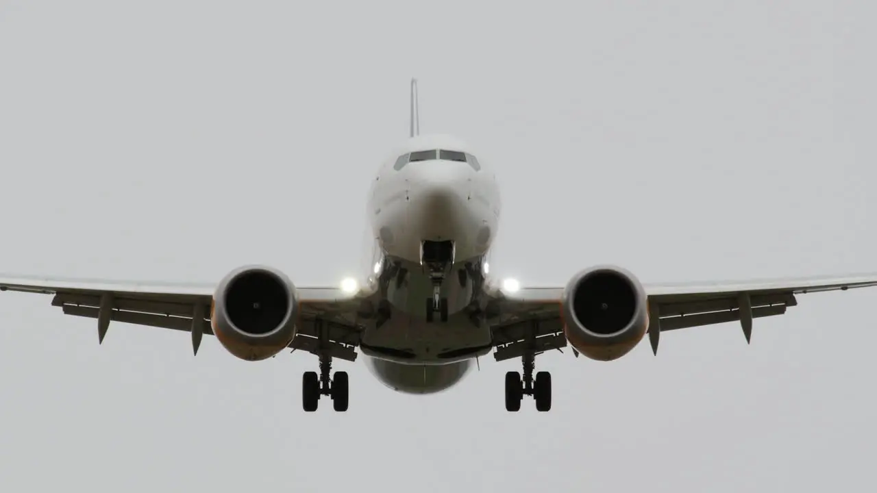 Frontal view of passenger airplane landing