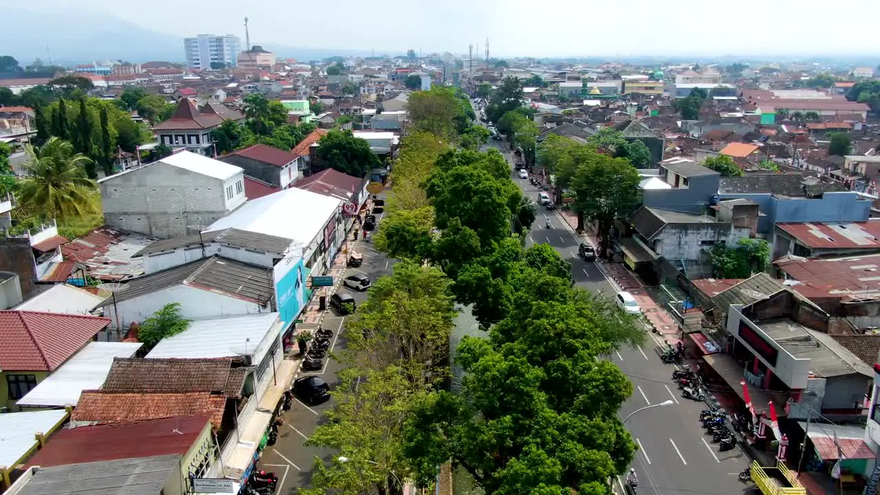 Urban water channel in green belt in middle of street Magelang city Indonesia