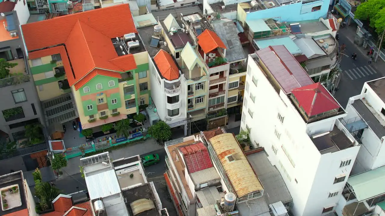 aerial drone circling a residential alley in district one of Ho Chi Minh City Vietnam on a sunny afternoon