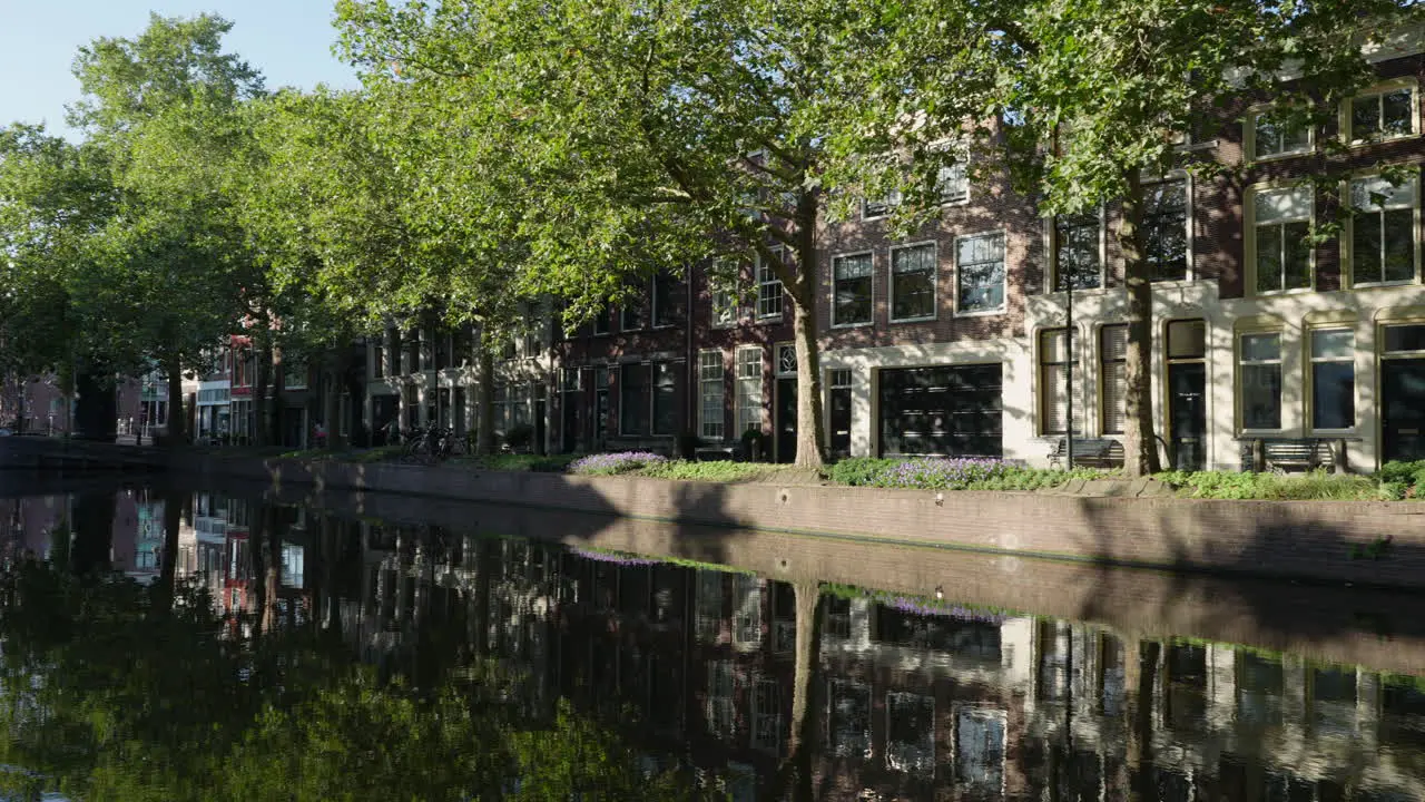 Large Canals With Tree Reflections At Lage Gouwe Street Gouda City Center Netherlands