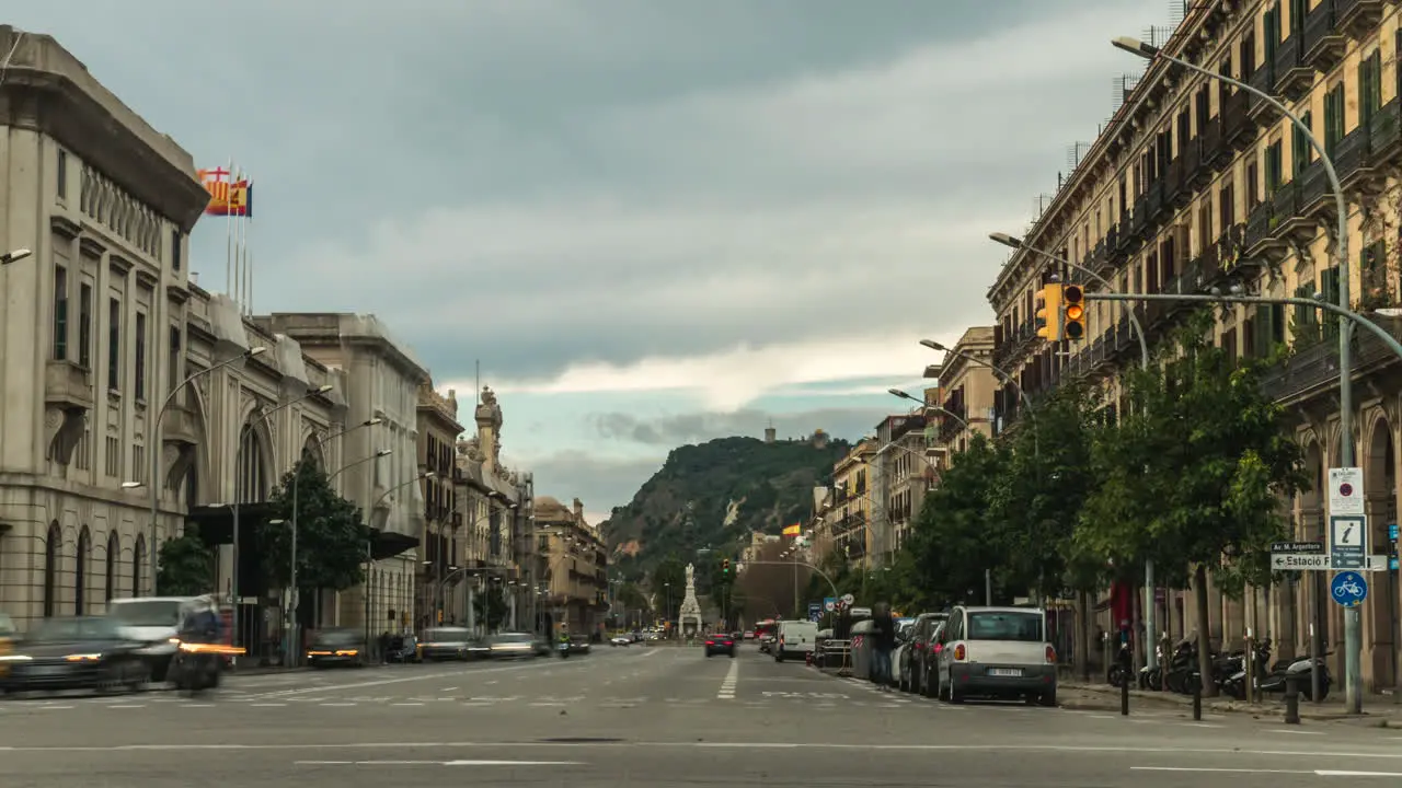 Timelapse Avinguda Argentera Spanish public street cityscape transport and architecture slow push in