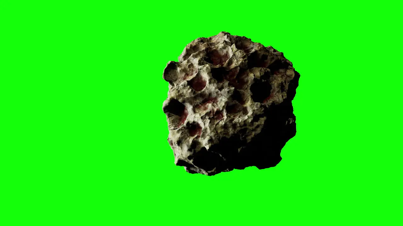 Brown-Grey Asteroid with notches and dents enters the view and is rushing towards the center of the screen on Greenscreen