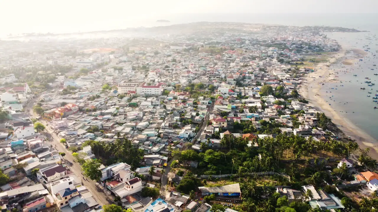 Scenic View of Mui Ne Urban City with Beach and Boats