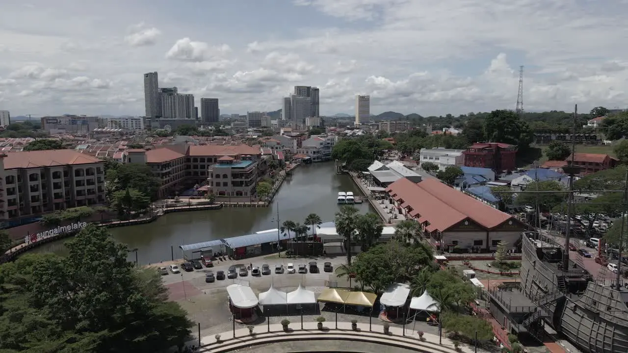 Low aerial flyover Maritime Museum ship and canal in Malacca Malaysia