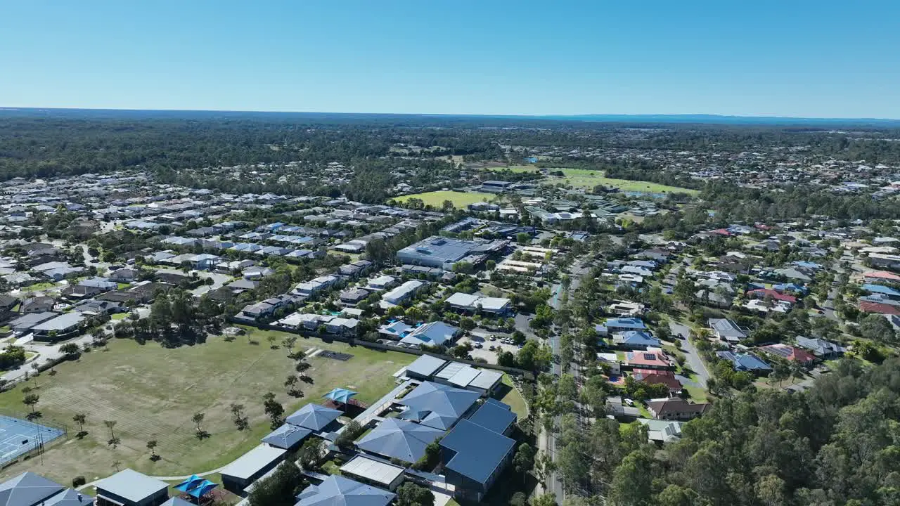 Drone push in tracking shot of Narangba Brisbane Queensland Suburb