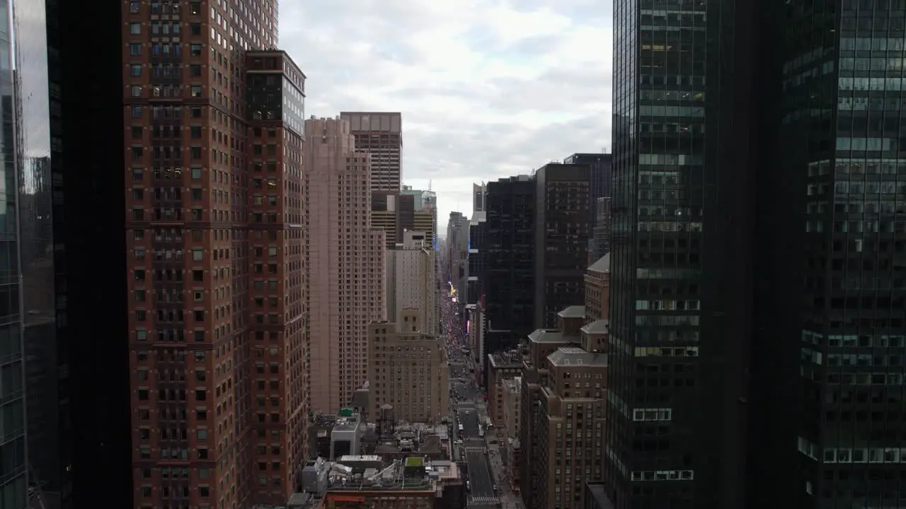 Aerial view over the 7th Avenue in Manhattan New York city USA reverse drone shot