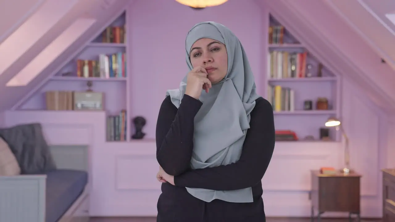 Confused Muslim woman thinking something