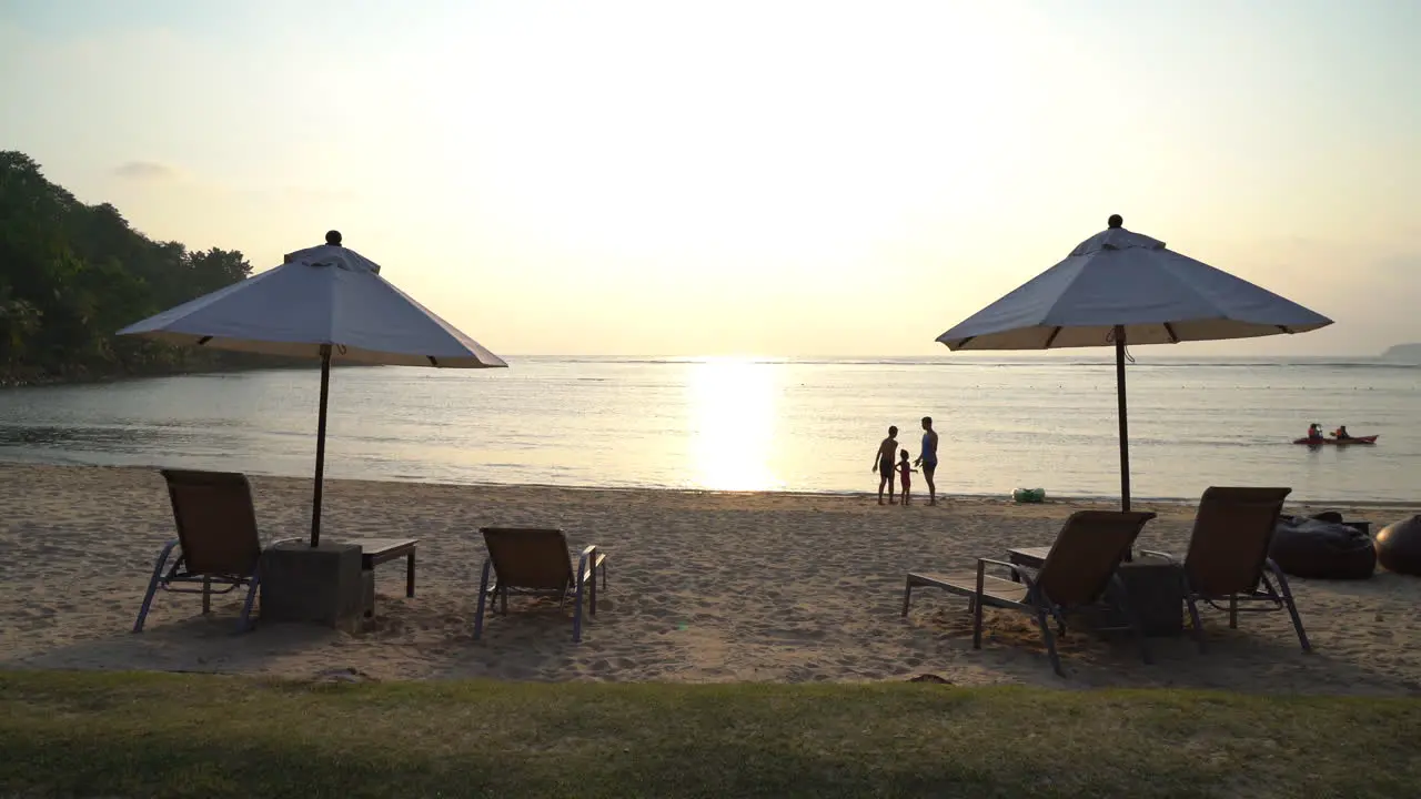 Sunset with umbrella pool bed