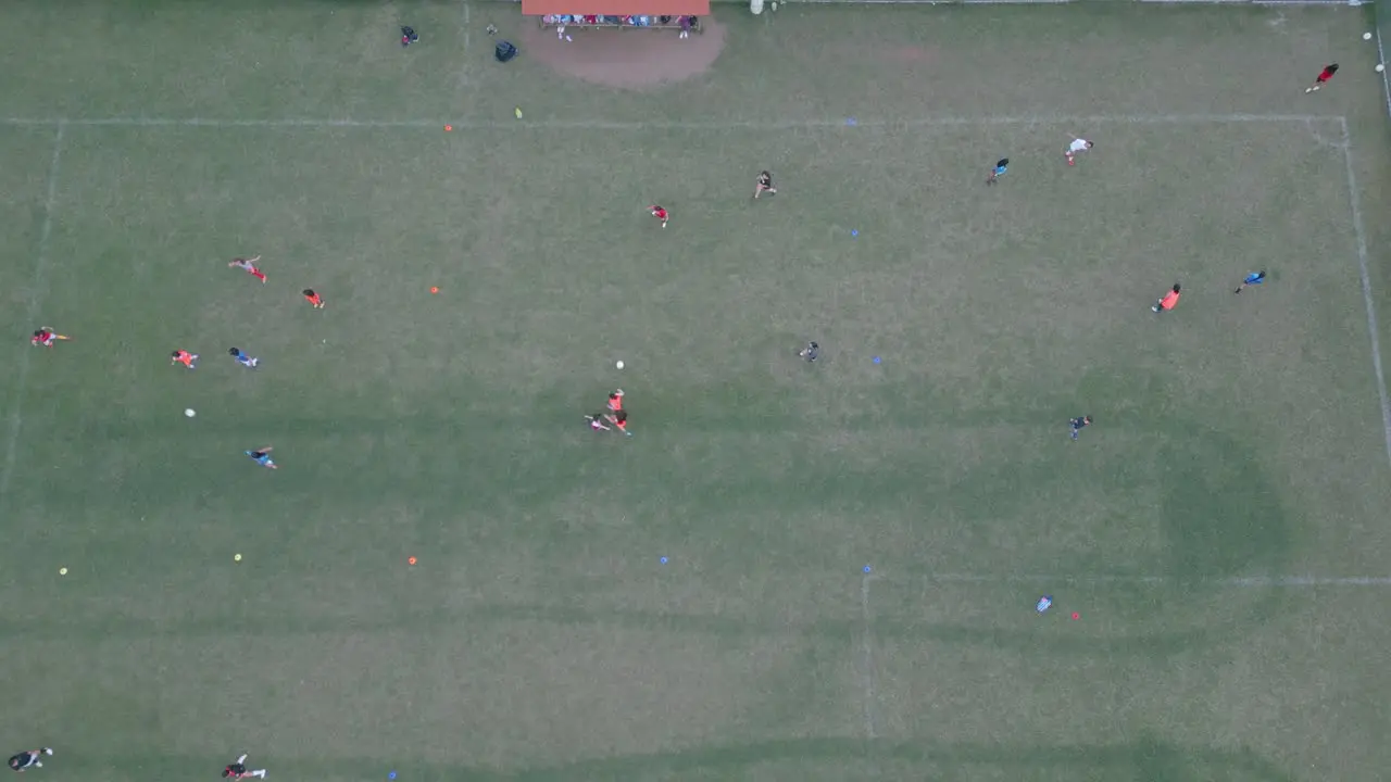 Rising Overhead Drone Shot of Girls Soccer Practice