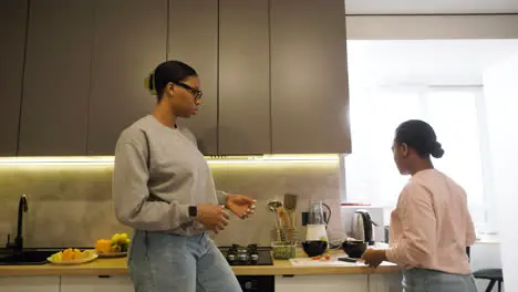 Women talking in the kitchen