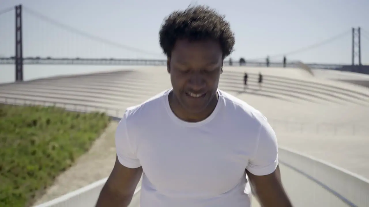 Closeup shot of African American man skipping rope outdoor